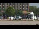 Cars line up at drive-through COVID-19 testing site in Houston