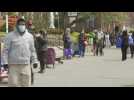 Residents in one of New York's hardest-hit areas line up for food