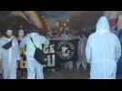 Football/Champions League: PSG fans descend upon Parc des Princes in hazmat suits