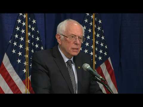 Sanders says priority is to beat Trump, remains in race