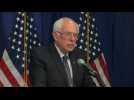 Sanders says priority is to beat Trump, remains in race
