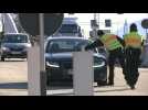 Coronavirus: German police officers control cars at border with Austria