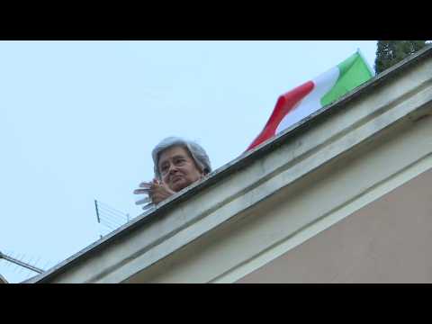 Italians in Rome sing 'Bella Ciao' as virus lockdown continues