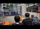 Hong Kong protesters gather near police station