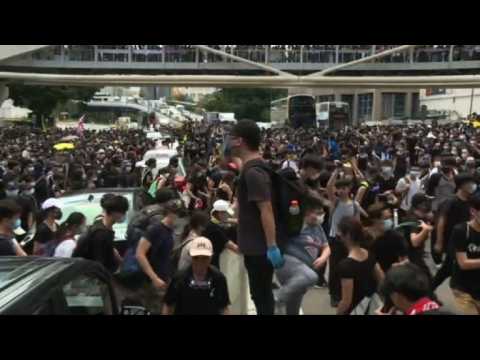 Hong Kong protesters block highway outside parliament