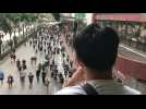 Hong Kong protesters defy police, hit city's centre