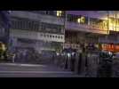 Hong Kong police tear gas protesters near Beijing liaison