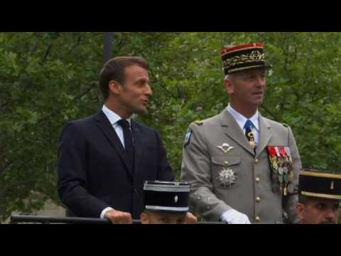 Macron arrives for Bastille Day parade