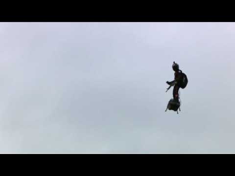 A "flying man" over the Champs-Elysees at Paris parade