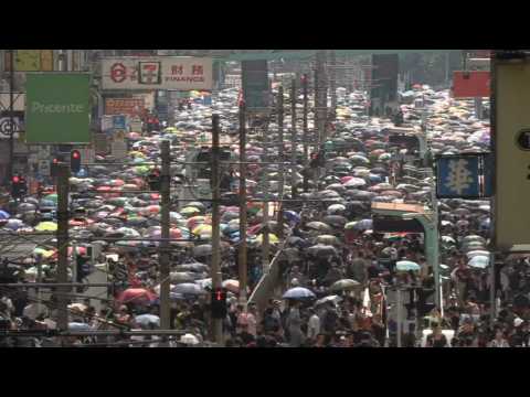 Hong Kongers defy police ban and gather for 'anti-triad' rally