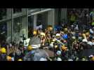 Protesters try to smash way into Hong Kong's parliament