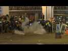 Tear gas and rubber bullets fired as Hong Kong returns to chaos