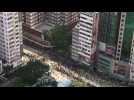 Hong Kong protesters march past police-sanctioned end point