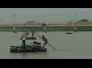 People cross the Suchiate river at Mexico-Guatemala border
