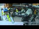 Hong Kong police fire pepper spray amid flashmobs