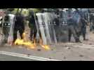 Hong Kong: Police and protesters battle outside university