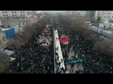 Iran: Mourners gather in Mashhad as top general's remains return