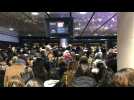 Passengers cram into Paris metro station amid transport strike chaos