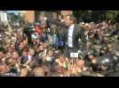 Venezuela's Guaido climbs on fence as access to parliament is blocked