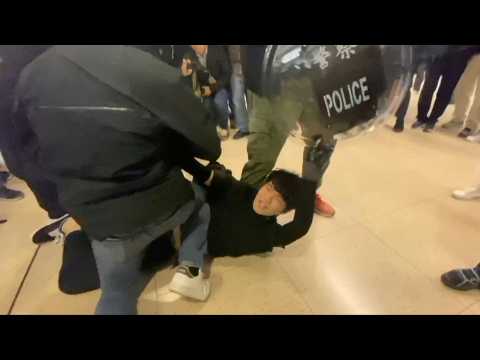 Arrests as Hong Kong calm broken, clashes erupt in mall