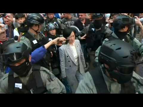 Pro-Beijing lawmaker heckled by crowd in Hong Kong