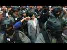 Pro-Beijing lawmaker heckled by crowd in Hong Kong