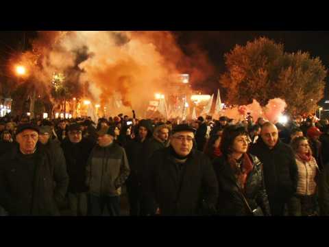 Anti-government protesters march in Tbilisi
