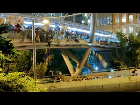 Dozens of Hong Kong protesters escape police siege at campus