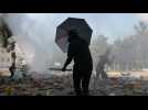 Police deploy water cannon against protesters occupying university campus