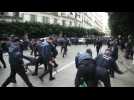 Police forces charge anti-election protesters in Algeria's capital