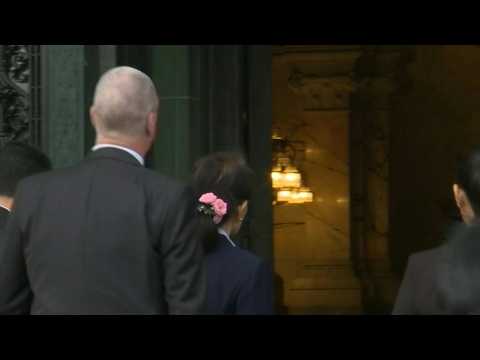 Aung San Suu Kyi arrives for second day of trial over Rohingya genocide case