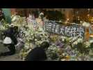 Vigil in Hong Kong for student who died after fall during clashes between police and protesters