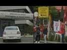 People wait outside police station in Curitiba for Lula's release