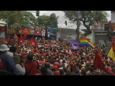 Lula's supporters await his arrival at rally at metalworkers' union