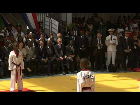 French president visits Ivory Coast, opens sports complex
