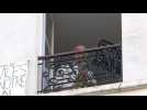 Parisians clap from their windows to thank medical staff