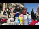 Michigan protesters give haircuts at anti-lockdown demonstration