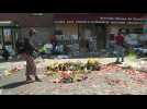 People pay tribute at site of George Floyd's arrest in Minneapolis