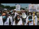 French health workers decry reforms outside Robert Debre Hospital