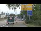 Vehicles cross French-German border as it reopens