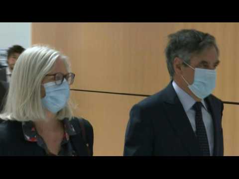 French ex-PM Fillon and wife arrive for Paris court's decision