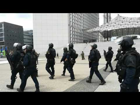 Paris business district evacuated after armed man reported