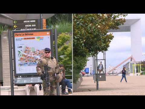 Paris business district under military lockdown amid reports of armed man