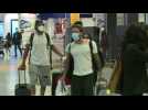 Travelers return to Fiumicino airport in Rome