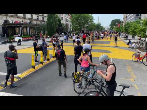 Protesters gather early at Black Lives Matter Plaza in Washington, DC