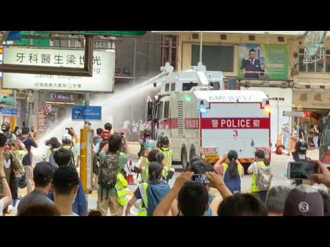 Photographer flattened by water cannon in Hong Kong