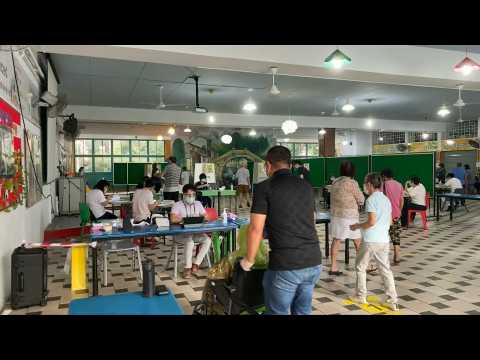 Polls open in Singapore general elections