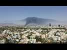 Smoke plume rises from a fire east of the northern part of Nicosia