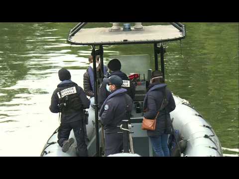 Paris river brigade patrols the canal Saint-Martin to prevent large gatherings