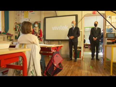 French education minister visits school near Paris